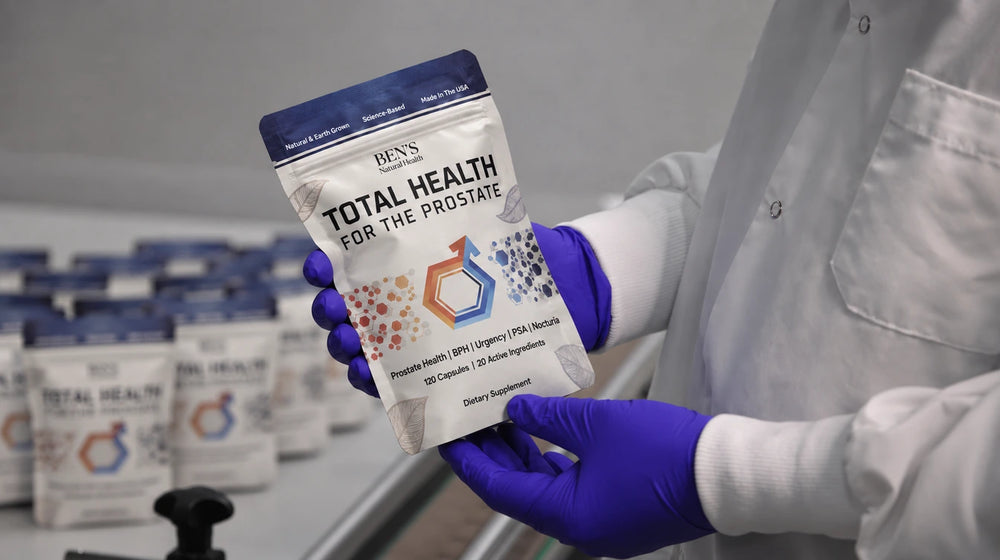 Total Health for the Prostate pouch held in a gloved hand in the lab